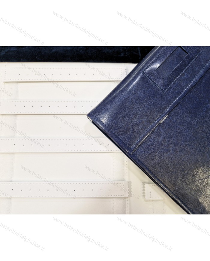 Rotolo blu interno bianco con strisce forate per orecchini
