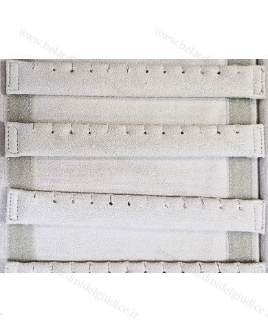 Rotolo champagne interno avorio con strisce forate per orecchini