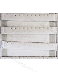 Rotolo champagne interno avorio con strisce forate per orecchini